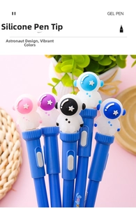 Detail showing silicone astronaut toppers and blue barrels of creative gel pens