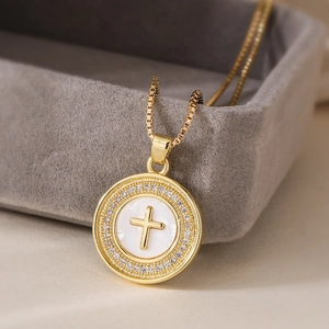 18K gold-plated copper cross pendant necklace with sparkling zirconia on jewelry box
