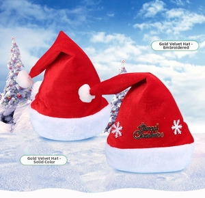Detail view of velvet Christmas hats with gold Merry Christmas lettering and snow patterns