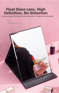 Close-up of a portable folding makeup mirror with elegant diamond-polished edges