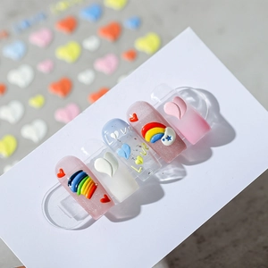 3D rainbow peach nail stickers with heart and LOVE embossed patterns on mixed color nails