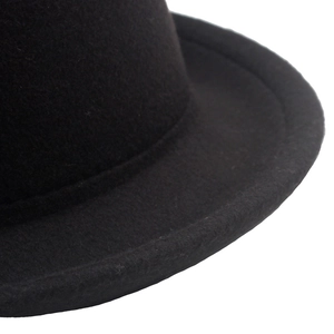 Close-up of high-quality black felt wool hat showcasing fiber texture and detailed stitching