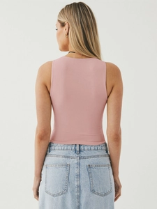 Detailed back view of a pink Y2K ribbed knit crop tank top showing fitted design