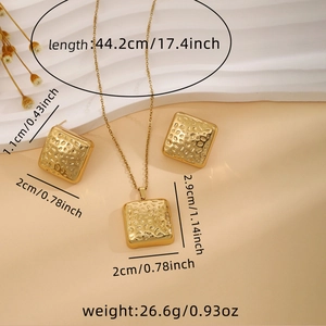 Detailed view of hammered gold jewelry set showing necklace and earring dimensions