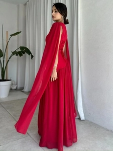 Elegant red floor-length gown with cape sleeves and open back for formal evening parties