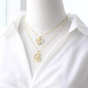Elegante collana con cuore placcata oro 18k con impronte di bimbo e catena a sfere