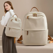 Detail view and model wearing a minimalist beige backpack with large capacity and brown straps