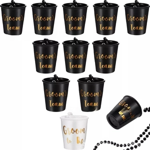 Detail view of 11 shot glasses with beads for bachelor parties and wedding celebrations