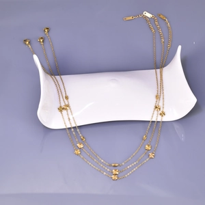 Three-layer 18K gold-plated stainless steel chain necklace with floral star pendants