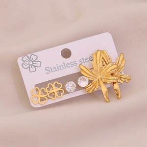 Three-pair gold stainless steel earring set featuring clover, zircon, and leaf designs