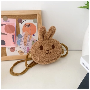 Detailed macro view of cute plush bunny crossbody bag with textured fabric and flower zipper