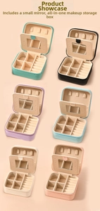 Portable leather jewelry box with mirror and divided sections in six pastel colors