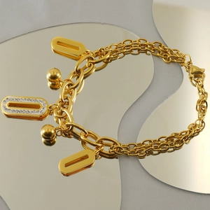 Modern 18k gold plated double chain bracelet with geometric pendants and pavé zircon stones