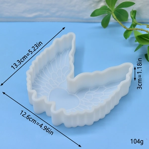 Wings shaped silicone mold with heart detail for DIY candles and handmade soap making