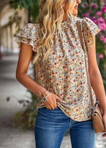 Detail of floral printed top with ruffled sleeves and beige round neck design