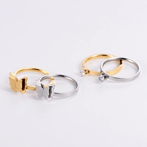 Detail of luxury frosted butterfly rings and sparkling cubic zirconia bridal sets