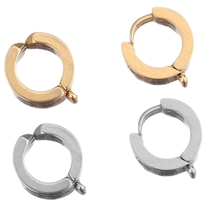 Macro view of gold and silver stainless steel ear clips with small hanging loops