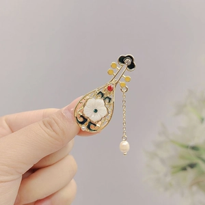 Chinese style pipa lute brooch in gold finish with shell flowers and long tassels
