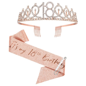 Detailed view of 18th birthday set with rose gold rhinestone crown, sash and pearl pin