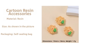 Detail view of 19mm resin gingerbread man and Christmas tree charms for DIY craft making