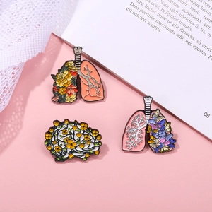 Lot de broches créatives en émail avec motifs organes et fleurs sur fond rose