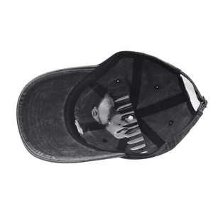 Detailed interior of vintage washed cotton baseball cap with seam reinforcement