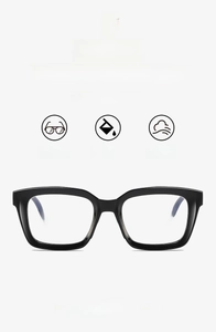Detail of square black frame glasses showing lightweight 24g build and flexible temples