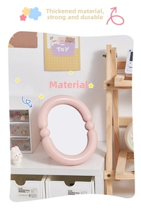 Pink bubble frame desktop makeup mirror in a cozy indoor setting with sweet decor