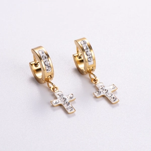 Golden stainless steel hoop earrings featuring white enamel and crystal paved cross charm