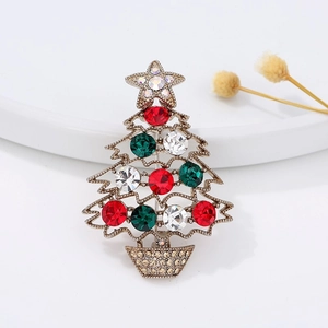 Macro detail of high-end Christmas tree brooch with colorful crystals on alloy base