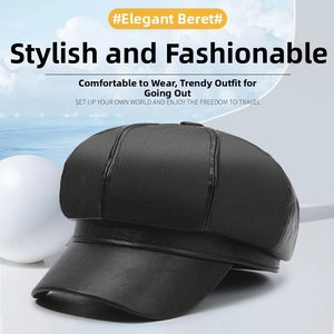 Detail view of black faux leather baker boy hat with lychee grain texture and flat brim