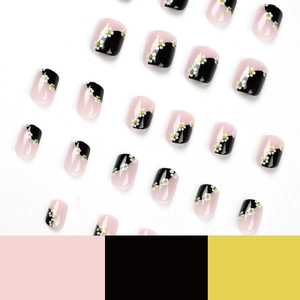 Faux ongles courts carrés-arrondis rose et noir avec motif floral de marguerite blanche