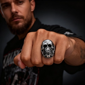 Vintage silver punk skull ring for men with chain detail and gothic rocker aesthetic