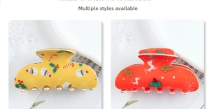 Detail of Christmas hair claws featuring snowman, reindeer, and gingerbread man patterns