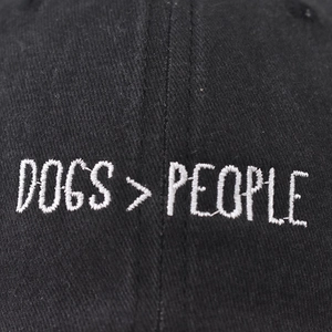 Washed black cotton baseball cap with white Dogs over People embroidery detail