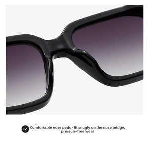 Close-up of comfortable integrated nose pads on black pilot sunglasses with gradient lenses