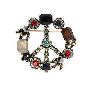 Vintage Baroque peace sign brooch with colorful rhinestones and bronze metal finish