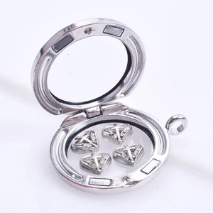 Silver floating charm locket with four cross-engraved hearts for Mother's Day