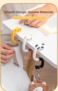Detail of portable desk hook with cartoon animal design for hanging student school bags