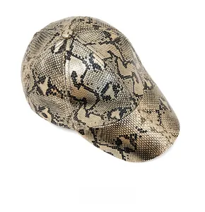 Detail of trendy snakeskin baseball cap showing golden metallic texture and stitching