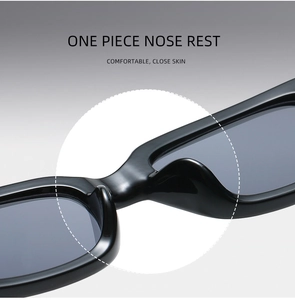 Detail view of the one-piece nose pads on black sunglasses for comfortable all-day wear