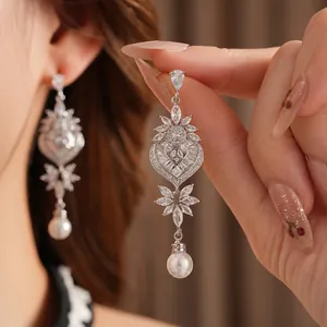 Silver leaf heart stud earrings with white pearls and sparkling cubic zirconia for women