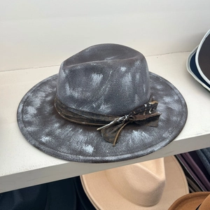 Vintage wide-brim distressed felt jazz hat with leather band and feather detail