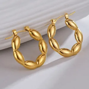 Polished gold-plated stainless steel hoop earrings with textured segmented design for women