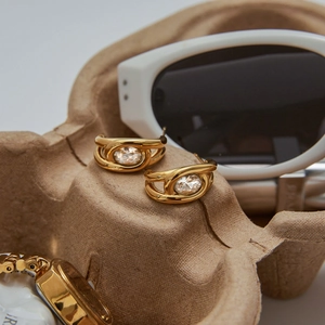 Luxurious gold stainless steel hoop earrings with crisscross design and sparkling zircon