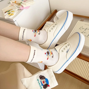 Fashionable mid-calf white socks with cartoon puppy prints and casual canvas sneakers