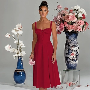 Close-up of red high-slit sundress with waist-cinching cut on a fashion model