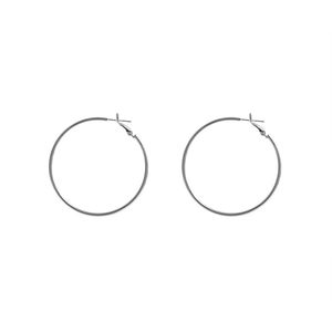 Minimalist silver metal large hoop earrings with polished finish and classic pin closure