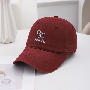 Classic burgundy cotton baseball cap featuring One Day Sober white embroidery on front