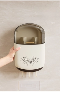 Detail of cream wall-mounted chopstick holder with dust-proof lid and utility hooks
